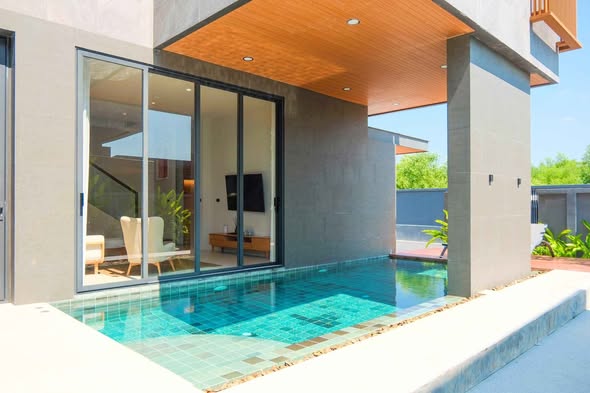 pool and room interior of 3 Bedroom Villa Din Daeng BKK