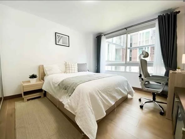 bedroom of 49 Plus