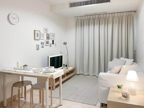 bedroom and living room of 59 Heritage