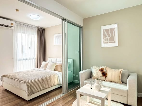 bedroom and living room of a space ME Rattanathibet