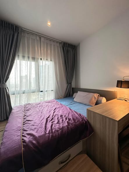 bedroom of Altitude Unicorn Sathorn