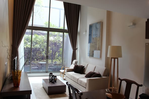 bedroom and living room of Altitude Unicorn Sathorn