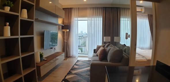 living room and bedroom of Amber Condominium By Eastern Star