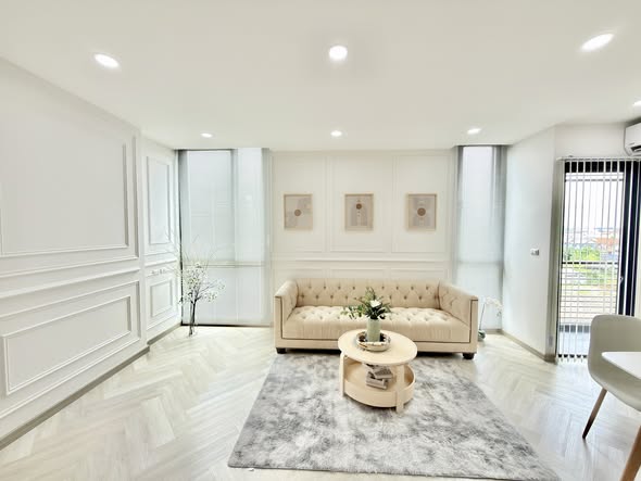 bedroom and living room of Apple Condominium