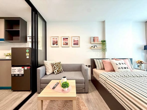 living room and bedroom of Atmoz Palacio Ladprao Wanghin | แอทโมซ พาลาซิโอ ลาดพร้าว วังหิน