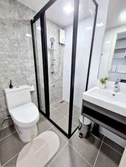 room interior and bathroom of Atmoz Tropicana Bangna