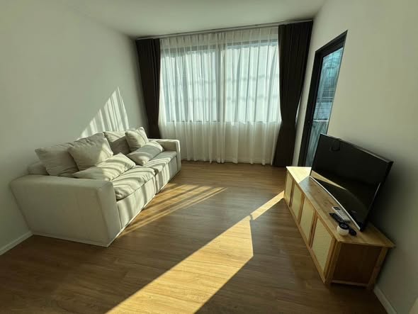 living room and bedroom of Baan Klang Muang The Paris Rama 9 – Ramkamhaeng