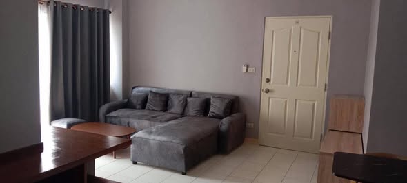bedroom and living room of Baan Suan LaSalle Condominium