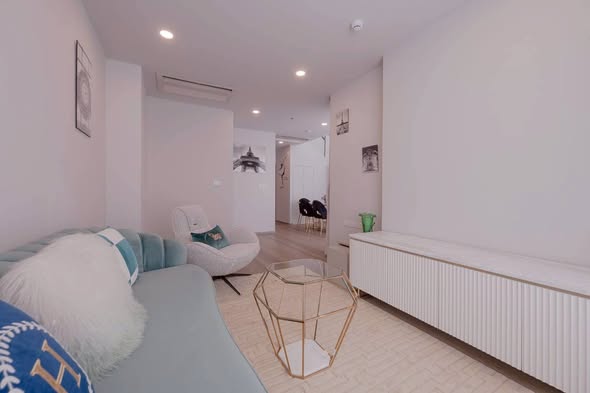bedroom and living room of อัพเอกมัยคอนโดมิเนียม