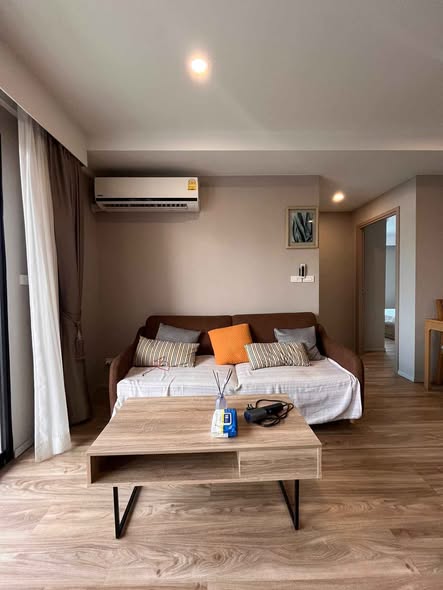 bedroom and living room of Blossom Condo Sathon-Charoen Rat