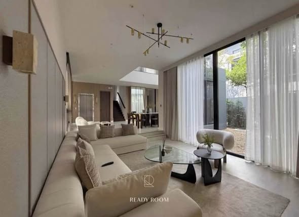 living room and bedroom of บูก้าน กรุงเทพกรีฑา | Bugaan Krungthep Kreetha
