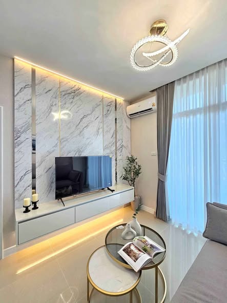 living room and bedroom of CC Condominium 1