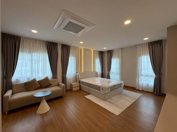living room and bedroom of Centro Bangna