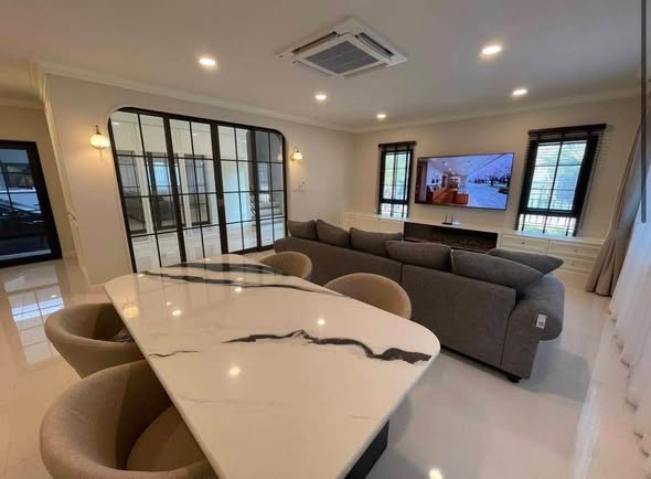 living room and kitchen of Centro Bangna