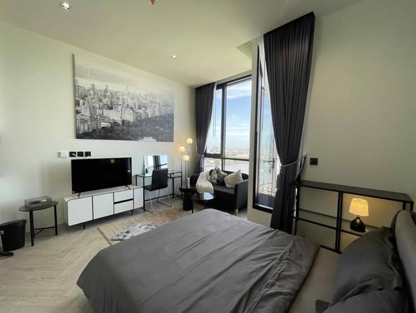 bedroom and living room of Chapter Charoennakhon–Riverside