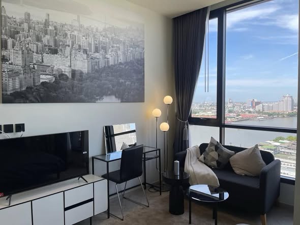 bedroom and living room of Chapter Charoennakhon–Riverside