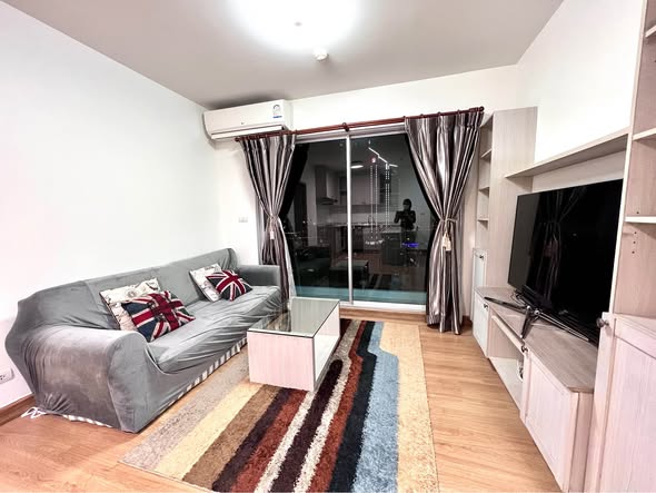 living room and bedroom of Chapter One Coffee