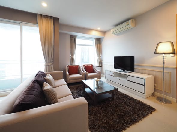 bedroom and living room of Circle Condominium