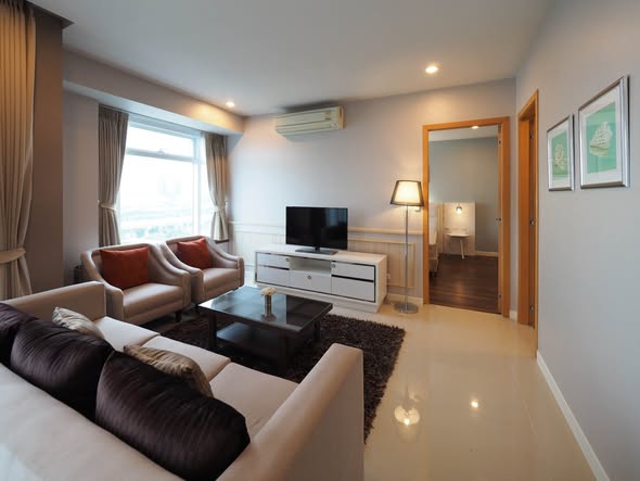 living room and bedroom of Circle Condominium