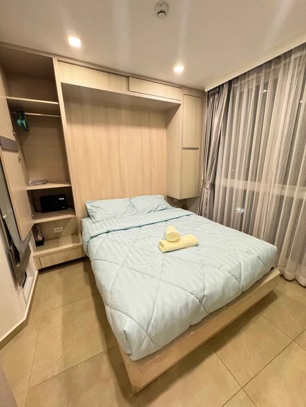 bedroom of City Garden Olympus Condominium