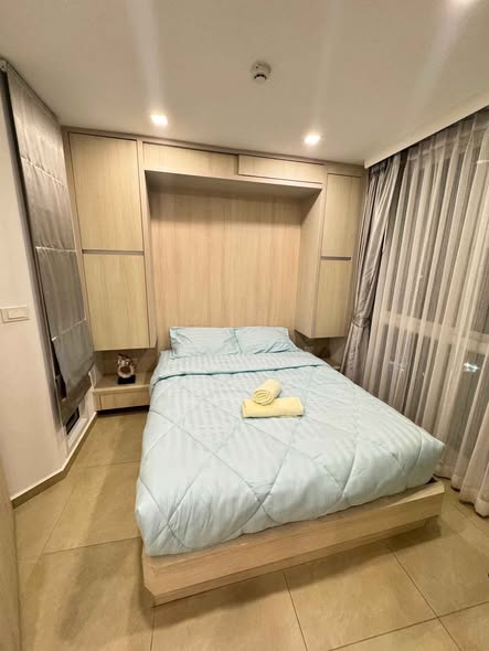 bedroom of City Garden Olympus Condominium