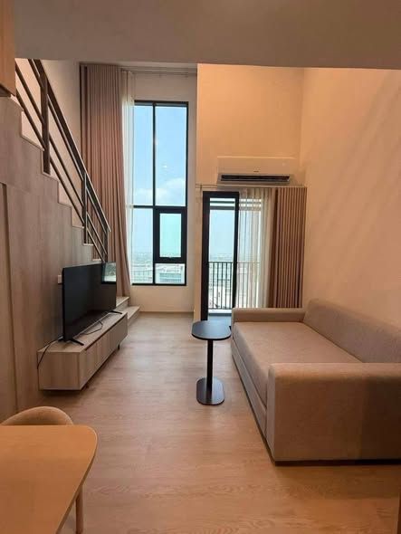 bedroom and living room of COBE Kaset-Sripatum (โค้บบ์ เกษตร-ศรีปทุม)