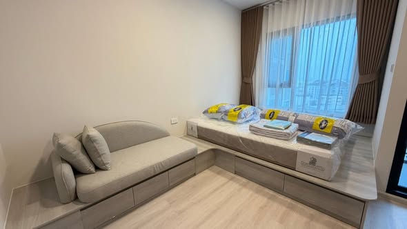 bedroom and living room of COBE Ratchada-Rama 9