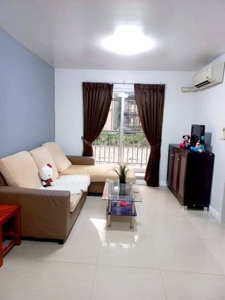 living room and bedroom of Condo One SIAM