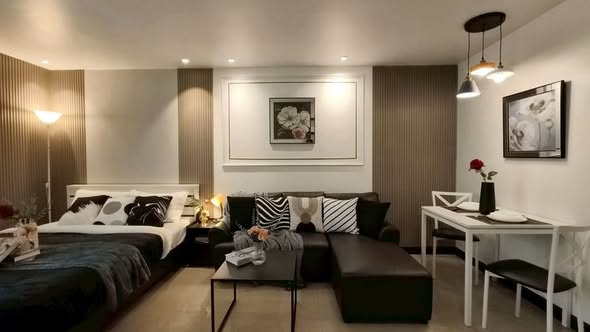 living room and bedroom of Condo Regent Home 7/1