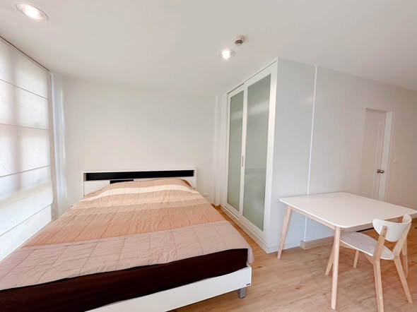 bedroom and room interior of D65 Condominium