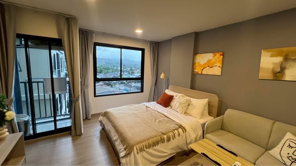 bedroom of dcondo Reef Phuket