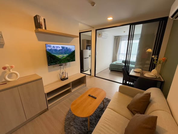 bedroom and living room of dcondo Reef Phuket