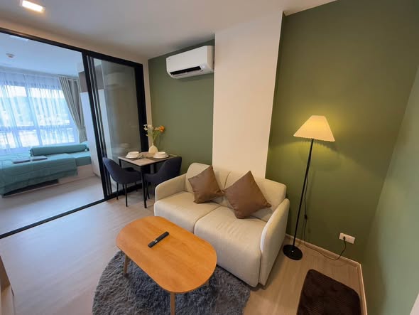 bedroom and living room of dcondo Reef Phuket