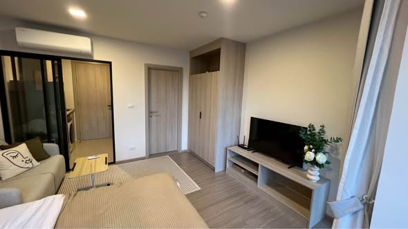 bedroom and room interior of dcondo Reef Phuket