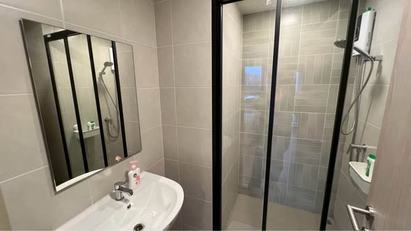 room interior and bathroom of dcondo Reef Phuket