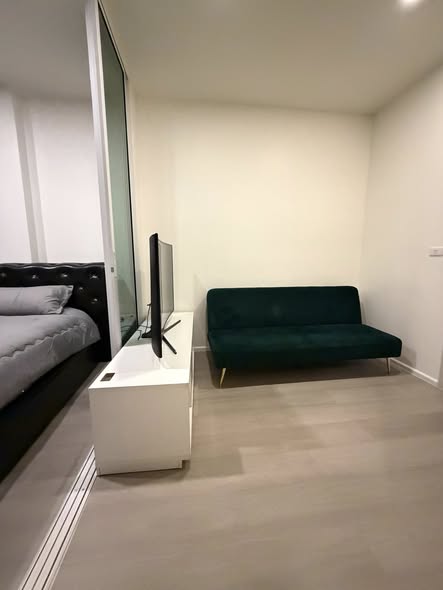 living room and bedroom of De Lapis Charan 81 by Grand Unity