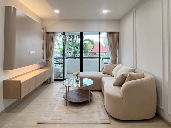 living room and bedroom of Eastwood Park Condominium
