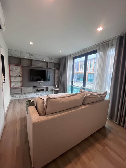 bedroom and living room of Eigen Premium Townhome