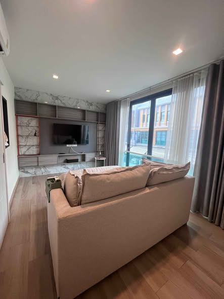 living room and bedroom of Eigen Premium Townhome