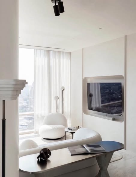 living room and bedroom of Four Seasons Private Residences