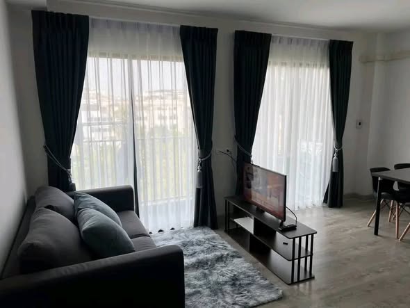 living room and bedroom of G HAUS Condominium Santikham 4