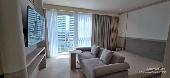 living room and bedroom of GM Estate Hotel & Executive Apartments