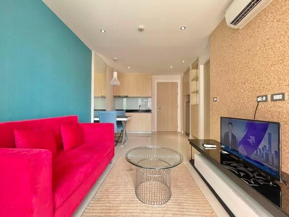 living room and bedroom of Grande Caribbean Condo