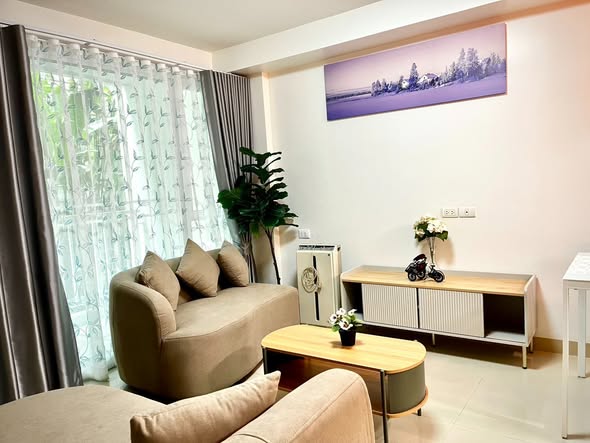 living room and bedroom of Haven Condominium