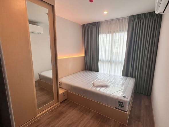 bedroom of HI Kaset-Sena Nikhom Station by AOS