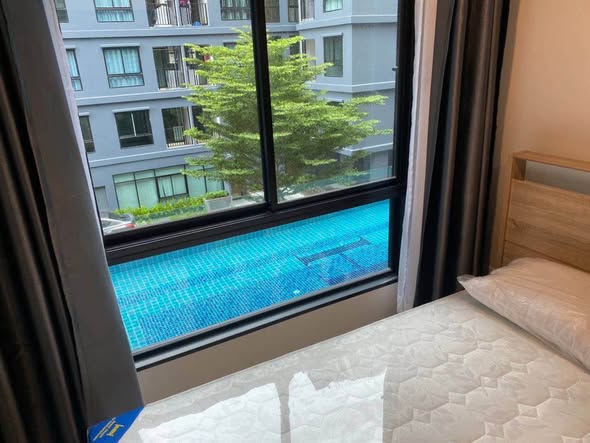 bedroom of HI SEACON STATION – Condominium