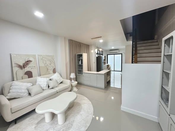 bedroom and living room of Home In Town