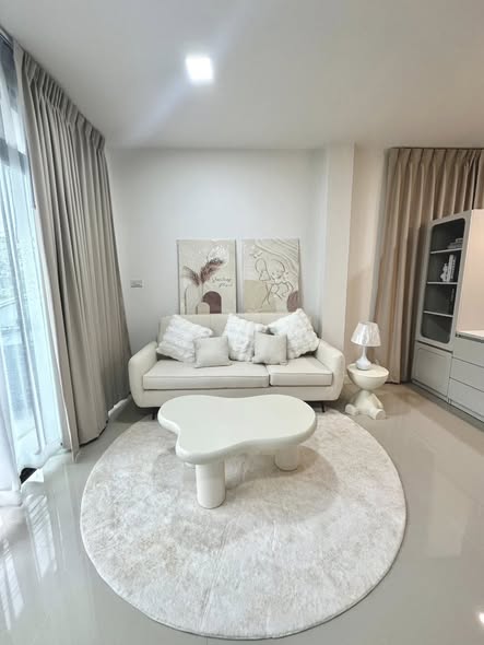 living room and bedroom of Home In Town