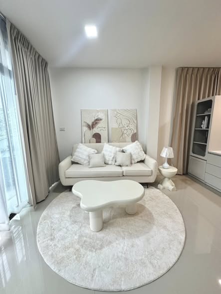 living room and bedroom of Home In Town