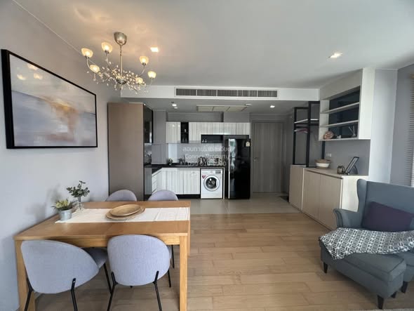 living room and kitchen of HQ by Sansiri